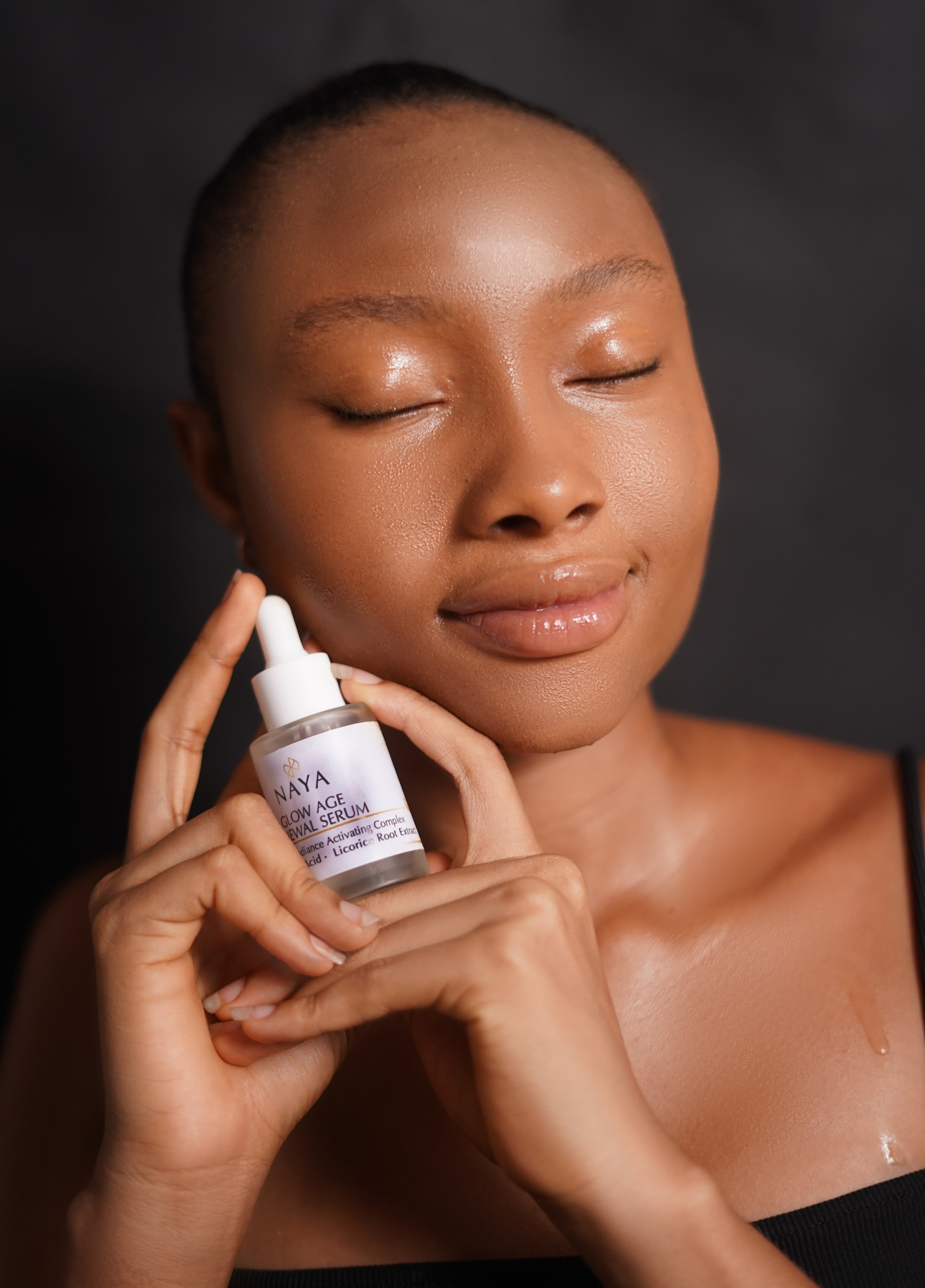 Naya Glows models holding Radiance Repair Lotion, Glow Body Oil, and Correcting Serum